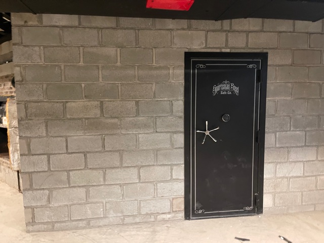 Vault door to vault room inside building