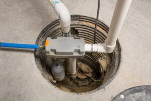 A newly installed sump pump in a basement